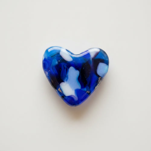 Blue and purple fused glass pocket heart with light-catching accents